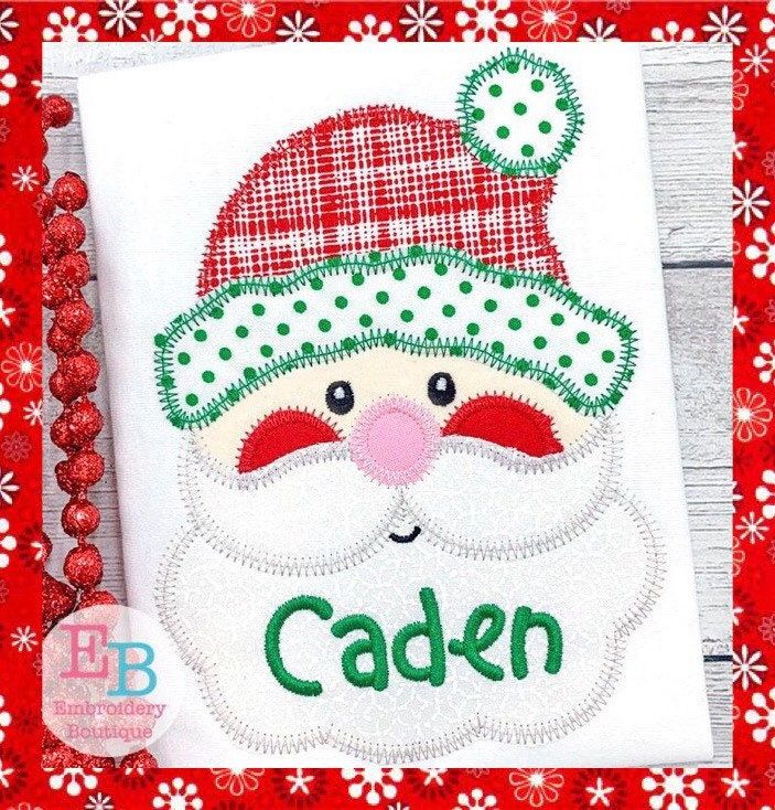 a santa claus face with the word caden on it and some red balls around it