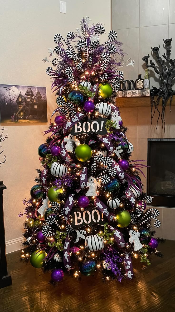 a decorated christmas tree with purple and green ornaments