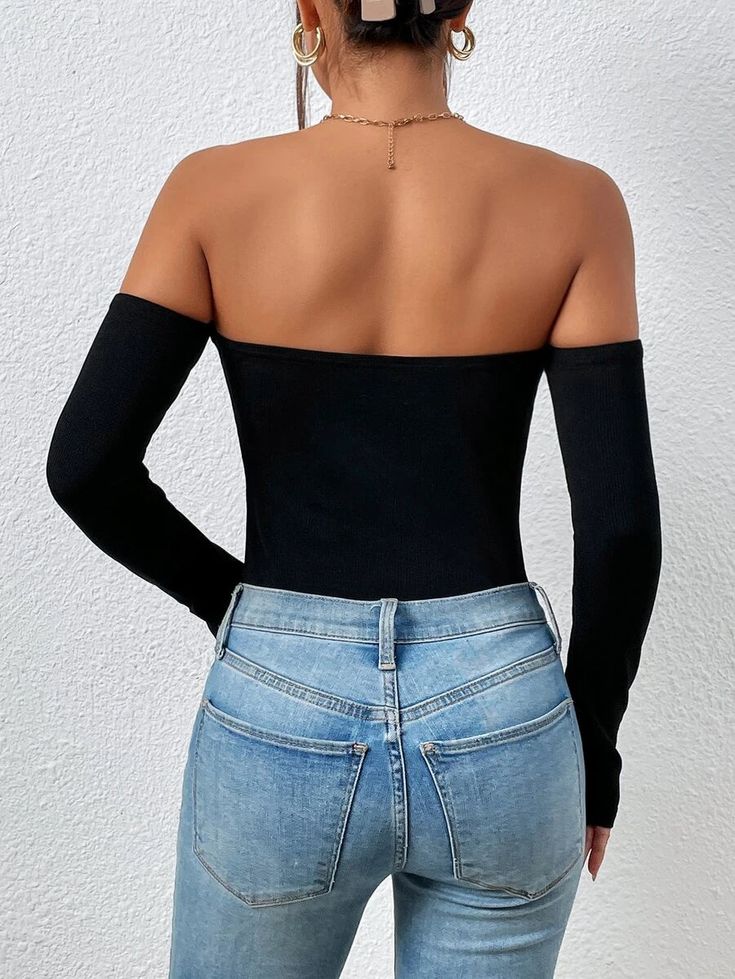 This Off-Shoulder Bodysuit is a showstopper. The long sleeves and slim fit design flatter your figure, while the medium-stretch fabric ensures comfort. The black color adds sophistication, perfect for a night out with friends or a date. The 95% Polyester and 5% Elastane composition ensures durability and easy maintenance. Whether you pair it with jeans or a skirt, you're sure to turn heads. Features: Color: Black Neckline: Off the Shoulder Sleeve Length: Long Sleeve Sleeve Type: Regular Sleeve F Comfy Jumpsuits, Fabric Medium, Body Measurements, Shoulder Sleeve, Sleeve Type, The Black, Stretch Fabric, Black Color, Off The Shoulder