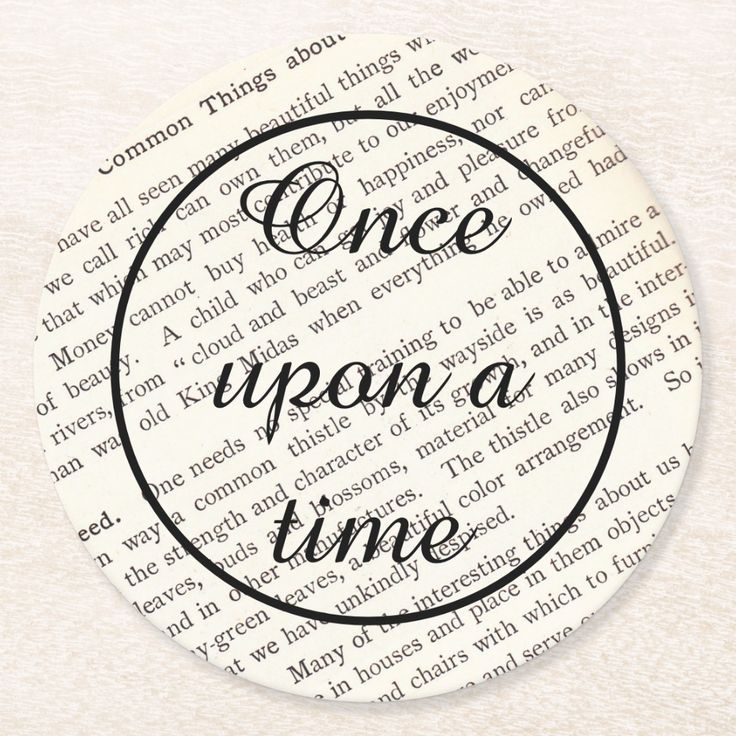 a white plate with the words once upon a time written in black ink on it