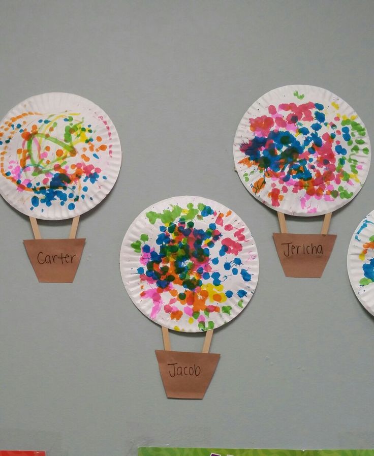 three paper plates with different colored sprinkles on them