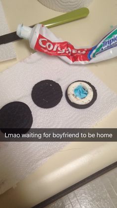 toothpaste and oreo cookies sitting on top of a piece of paper with the words limoo waiting for boyfriend to be home