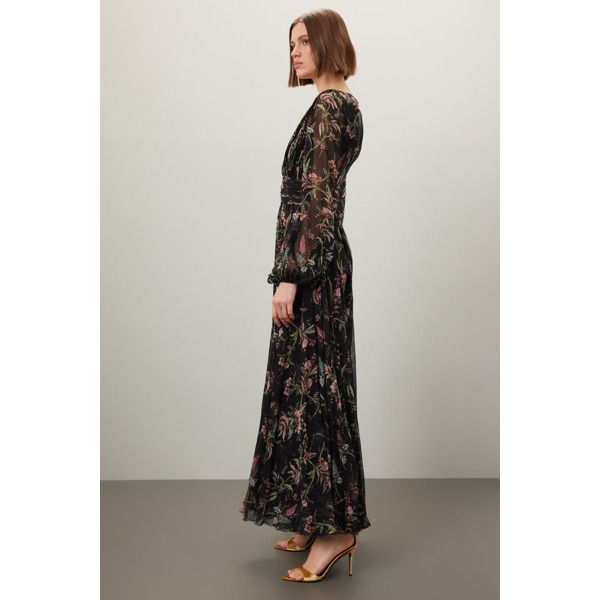 Black floral chiffon (100% Silk). A-line. Long sleeves. V-neck. Back zipper closure. 60" from shoulder to hemline. Imported. Floral Print Maxi Chiffon Evening Dress, Evening Floral Print Maxi Chiffon Dress, Flowy Floral Print Chiffon Evening Dress, Flowy Chiffon Floral Print Evening Dress, Floral Print Maxi Dress For Fall Cocktail, Fall Floral Print Maxi Cocktail Dress, Chic Floral V-neck Dress For Formal Occasions, Fall Floral Print Maxi Dress For Cocktail, Fall Cocktail Maxi Dress With Floral Print