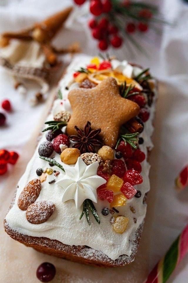 a piece of cake with icing and decorations on it