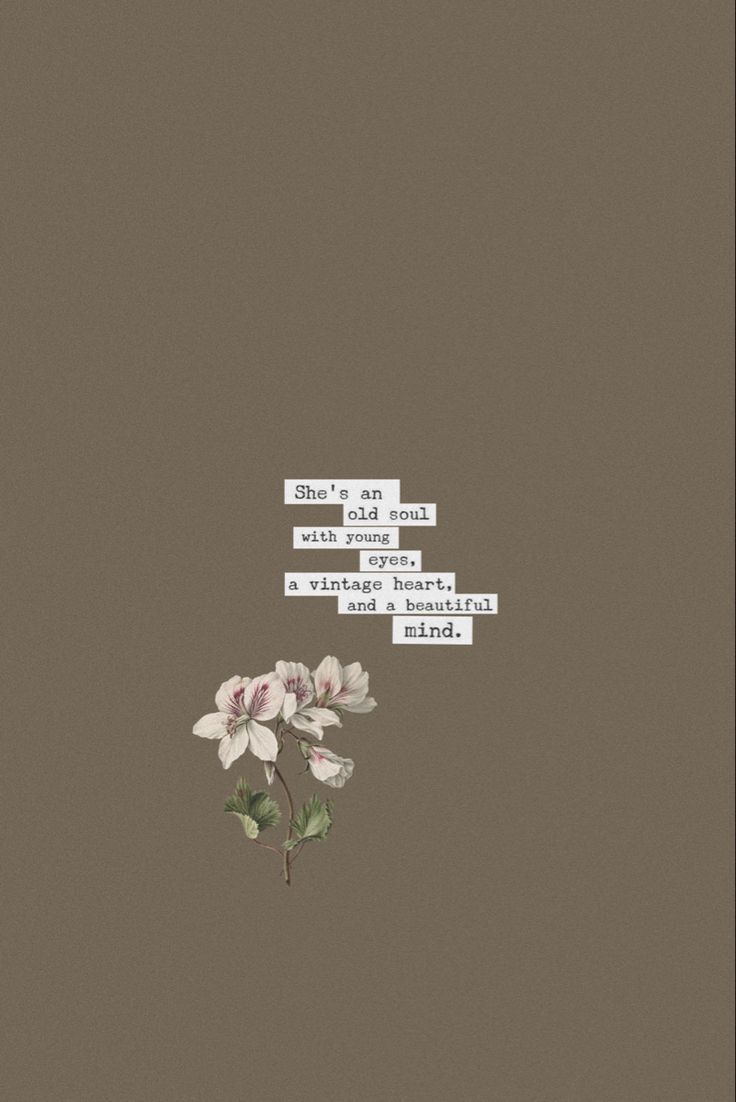 a flower with some words above it on a brown background