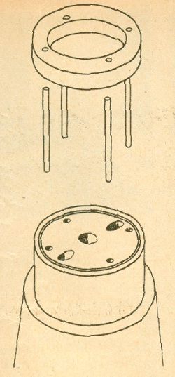 a drawing of a table with two stools