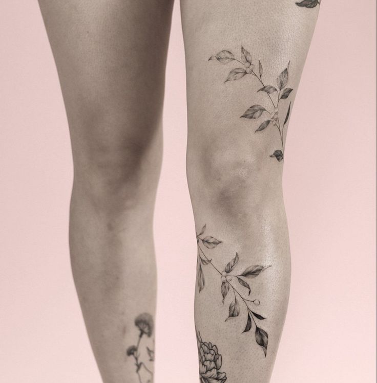 Tough Female Tattoos, Leaf Knee Tattoos Women, Flower Wrap Leg Tattoo, Leg Leaf Wrap Tattoo, Leg Plant Tattoos Women, Leaf Vine Wrap Around Tattoo Leg, Wrap Around Knee Tattoo Women, Floral Knee Wrap Tattoo, Leaves Wrapped Around Leg Tattoo