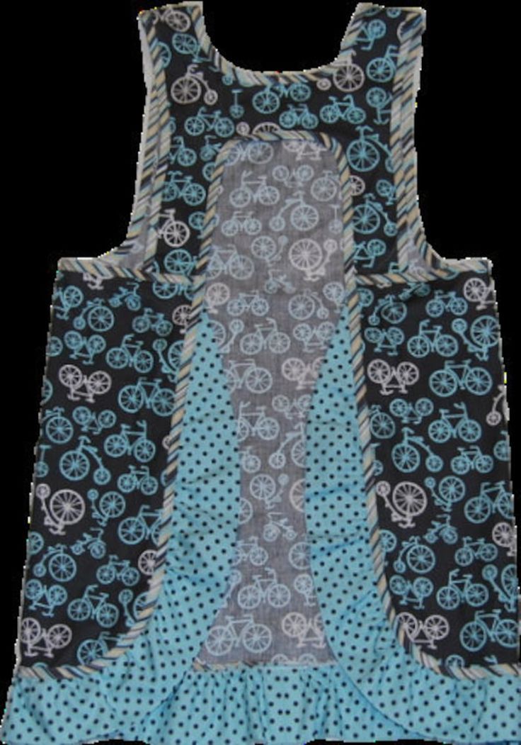 two aprons with bicycles on them and polka dotty blue, one in the shape of a bicycle