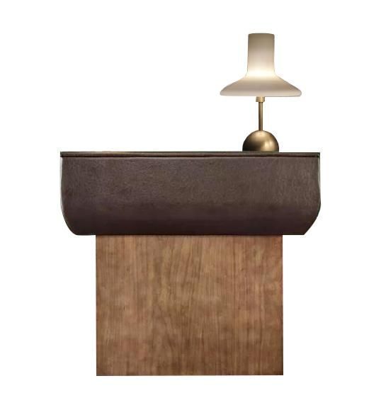 a lamp that is sitting on top of a wooden table next to a white wall