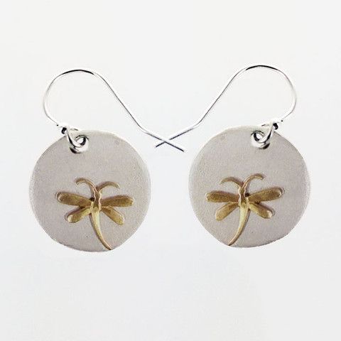 silver and gold dragonfly earrings on white background