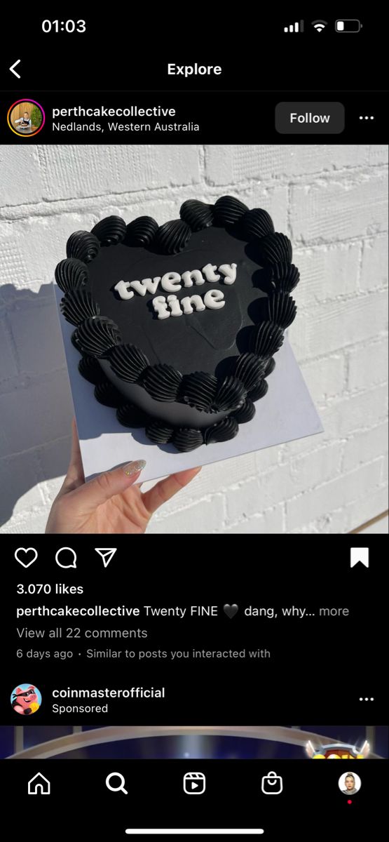 someone is holding up a cake with the words twenty nine on it