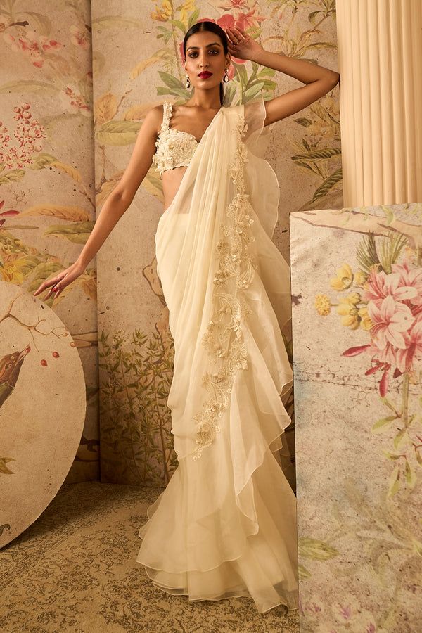 Dainty ivory draped sari and blouse Ivory Drapes, Saree Chiffon, Cut Work Blouse, Drape Sarees, Ridhi Mehra, Draped Saree, Ruffle Saree, Embroidered Crop Tops, Drape Saree