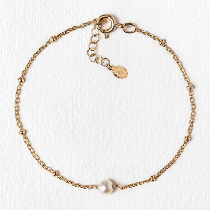 description This dainty bracelet is minimal and elegant. Features a Freshwater pearl wirewrapped onto an Italian bead chain. Beautifully packaged with our signature box, this will be a gift your bridesmaid will love and want to wear everyday! end description materials Available in: .925 Sterling Silver / Gold Vermeil / Rose Gold Vermeil Fresh Water Pearl, 3mm (natural pearl sizes vary slightly) Hypoallergenic, lead, and nickel free end materials details Length: 6.25in (16cm) + Extension: 1in (2. Bridal Bracelets, Circle Bracelet, Back Necklace, Dainty Bracelet, Back Jewelry, Jewelry Bridal, Bridesmaid Bracelet, Crystal Chain, Bridal Bracelet