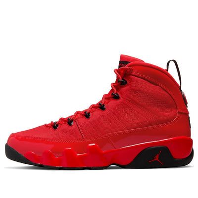 The Nike Air Jordan 9 Retro "Chile Red" is a nod to the 2012 "Motorboat Jones" colorway. This vibrant red sneaker features a textile upper, speed lacing system, and tonal patent leather on the mudguard, collar, and heel. Black accents include the tongue tag, molded eyelets, and pull loop at the heel. A glossy red polyurethane midsole and black rubber outsole complete the look of this stylish sneaker. (AJ9/SNKR/High Top/Basketball) Sports High-top Lace-up Sneakers With Red Sole, Red Sole High-top Lace-up Sneakers For Sports, Lace-up High-top Sneakers With Red Sole For Sports, Red Breathable Lace-up Custom Sneakers, University Red Sneakers For Sports, Red Streetwear Running Shoes, Red High-top Sneakers For Light Sports With Branded Insole, Red High-top Sneakers With Branded Insole For Light Sports, University Red Sneakers With Abzorb Midsole For Sports