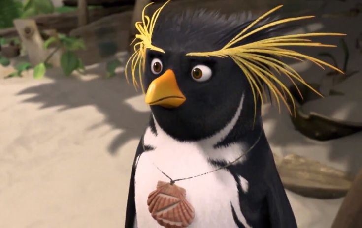 a cartoon penguin with yellow hair and an acorn on it's chest stands in front of a sandy area