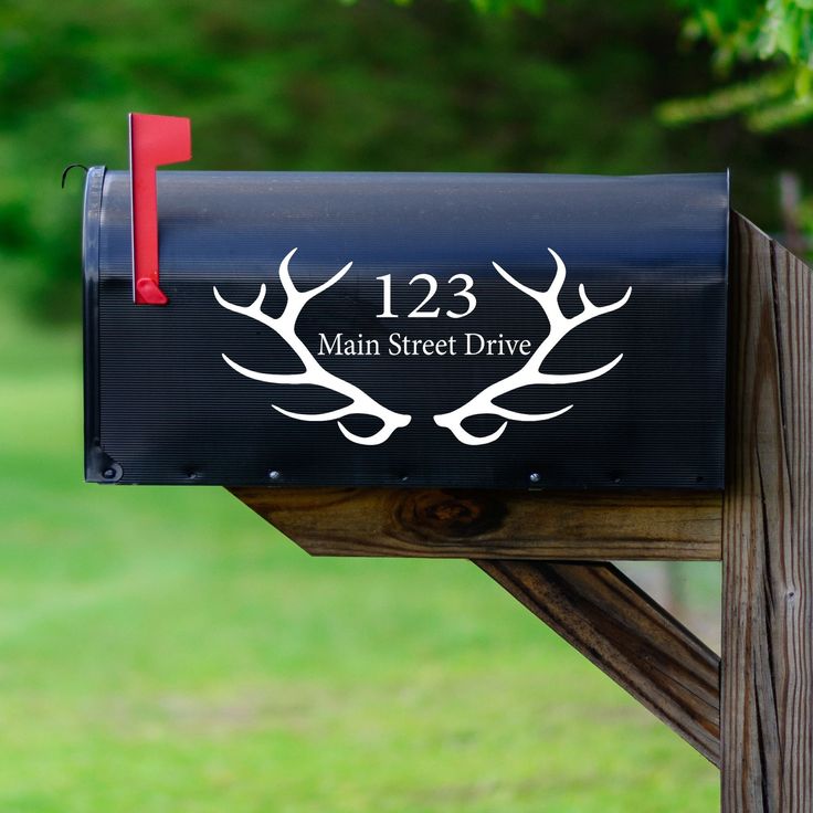 a mailbox with the name 123 main street drive written on it