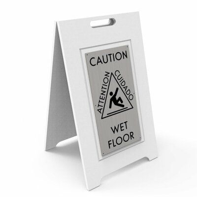 a sign that is standing up against a white background with the words caution written on it