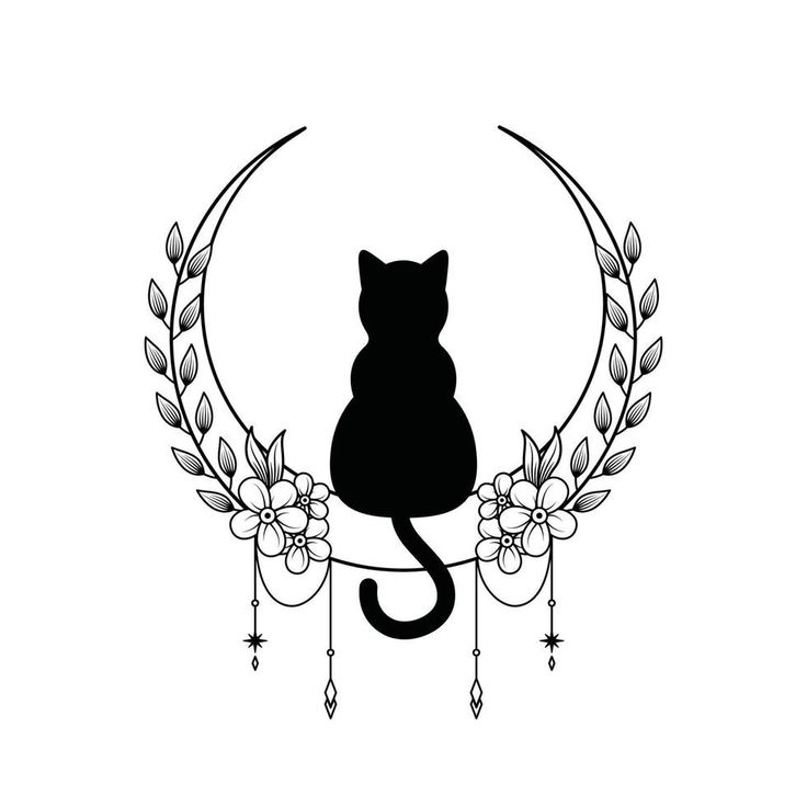 a black cat sitting on top of a crescent