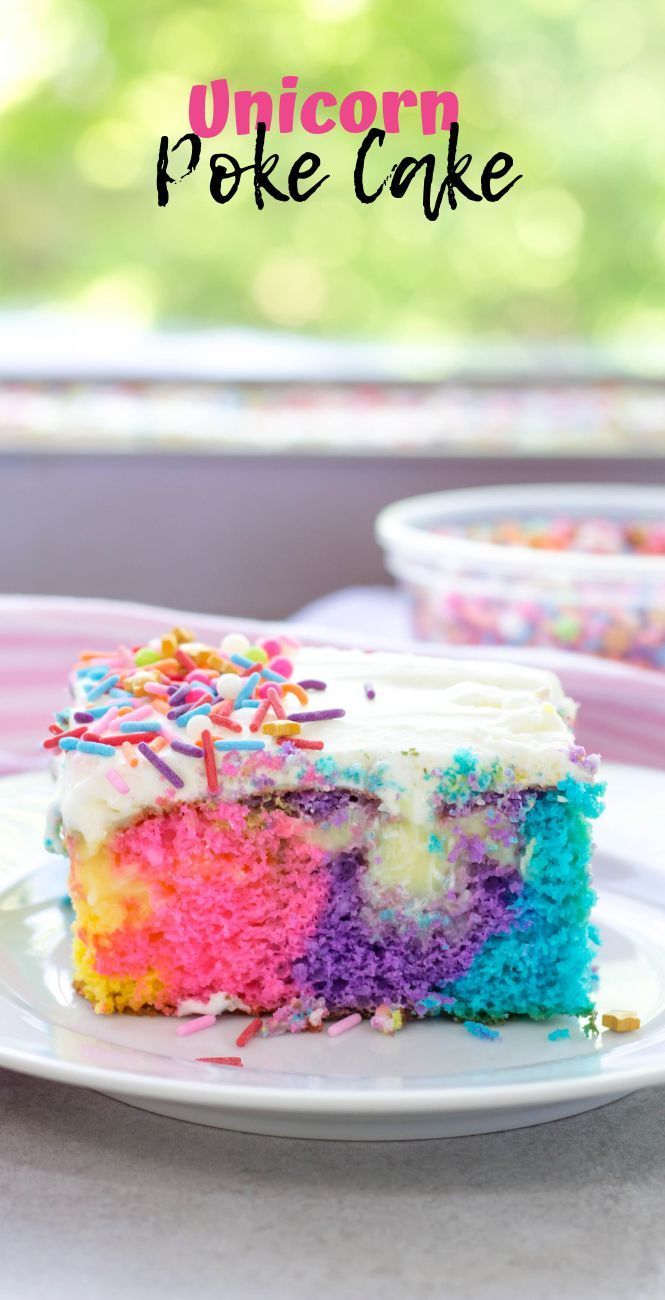 a slice of rainbow poke cake on a plate