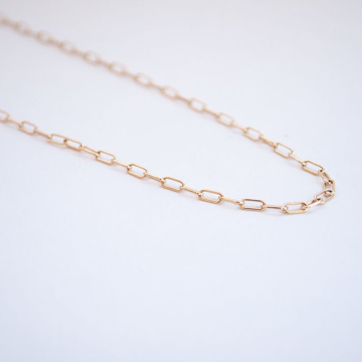 The perfect gold cable chain by Lauren Wolf to hold your charms, layer on golden sparkle, or spring a sense of subtle elegance on its own. Metal: 14k Yellow Gold Measurements: Chain width: 2.6mm, Chain: 18", 20" 18", 20" in stock Shop Chains + Charms > Classic Rose Gold Link Chain Necklace, Everyday Rolo Chain Link Necklace, Rose Gold Chain Necklace With Rectangular Links, Rose Gold Chain Necklace With Delicate Rectangular Links, Timeless Delicate Chain Necklace In Rose Gold, Timeless Rolo Chain Necklace Gift, Rose Gold Link Chain Necklace With Paperclip Chain, Timeless Rolo Chain Necklace For Gifts, Timeless Rolo Chain Necklace As Gift