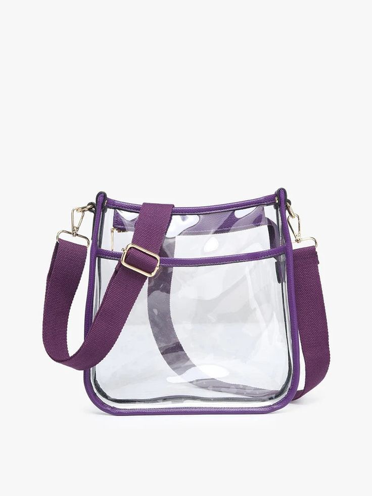 Posie Clear Crossbody with purple strap and trim. Clear Bag, Clear Bags, Guitar Strap, Compact Design, Front Open, Leather Trims, Easy Access, Game Day, Cruelty Free