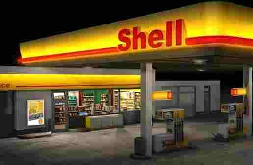 an artist's rendering of a shell gas station at night with the lights on