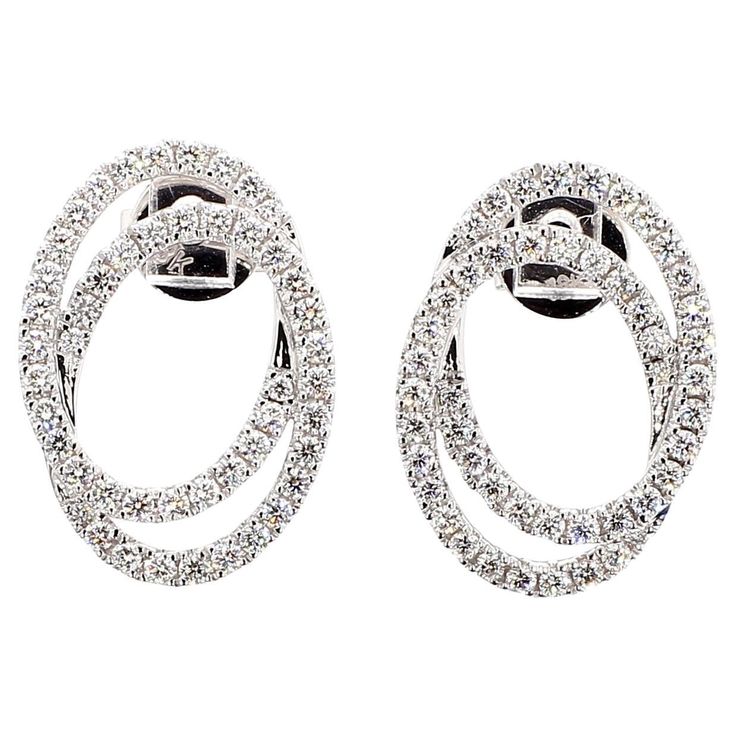 RareGemWorld's classic diamond earrings. Mounted in a beautiful 18K White Gold setting with natural round cut white diamonds. These earrings are guaranteed to impress and enhance your personal collection! Total Weight: 0.85cts Natural Round White Diamonds 18K White Gold All diamonds are guaranteed natural International Shipments: Please note that customers are responsible for all import duties and taxes applicable to the country of shipment Returns: Returns accepted in original format within 14 days of receipt Do not forget to view our entire inventory! Thank you for reviewing our item Classic Diamond Earrings, White Gold Stud Earrings, White Gold Earrings Studs, White Gold Studs, White Gold Set, Gold Stud Earrings, Gold Stud, White Diamonds, Gold Studs