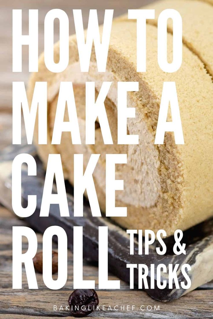 a loaf of cake sitting on top of a wooden table with the words how to make a cake roll and tricks