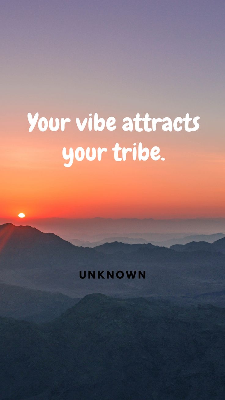 the sun setting over mountains with a quote on it that reads, your vibe attracts your tribe