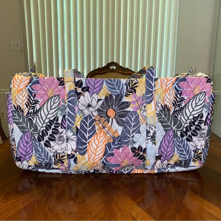 100% Authentic And Brand New With Tag. 26” W X 11" H X 11" D - 15" Strap Drop Stock Photos. Pattern Placement May Vary. Actual Color Might Be Different Due To Lighting. Exterior Features Two Pockets Zip Closure. Purple Rectangular Travel Bag For Daily Use, Lighting Exterior, Floral Color, Be Different, Vera Bradley Bags, Vera Bradley, Travel Bags, Stock Photos, Exterior