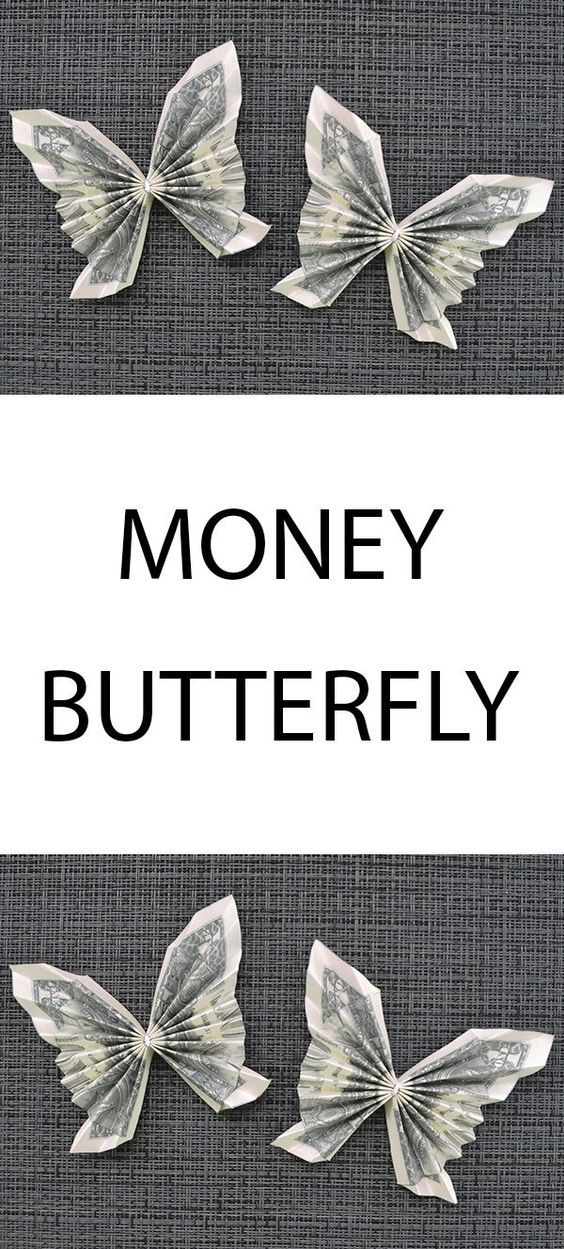 three butterflies made out of money sitting on top of a gray cloth with the words money butterfly