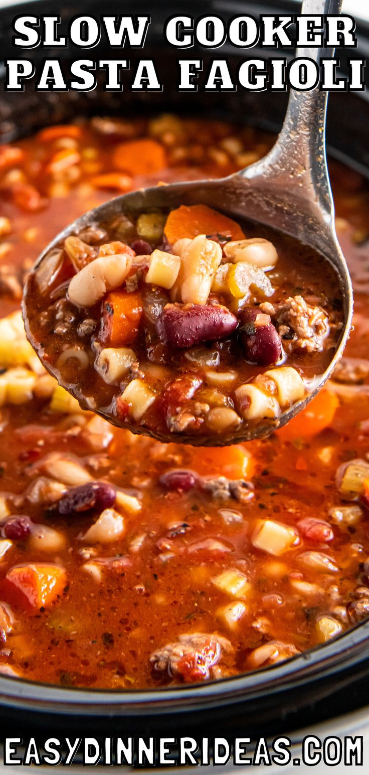 a ladle full of slow cooker pasta fagioi is being held by a spoon