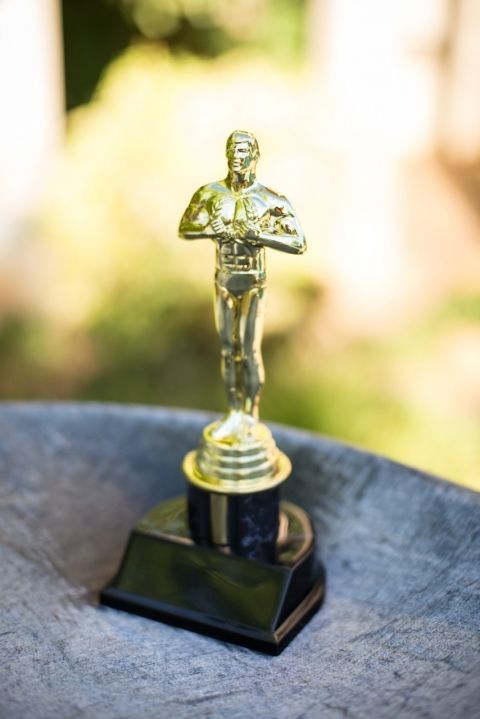 an award statue sitting on top of a table