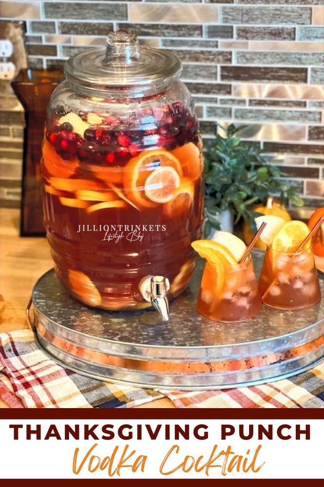 a glass jar filled with liquid sitting on top of a table