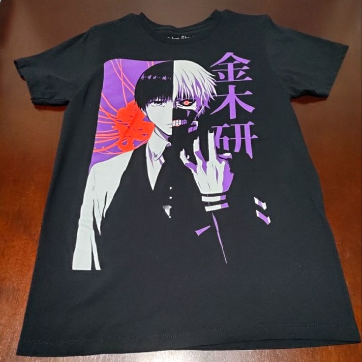 Never Worn Tokyo Ghoul Graphic T-Shirt!! Super Soft And In Brand New Condition! Edgy Graphic Print Top For Cosplay, Cool Black Tops With Graphic Design, Black Cotton Harajuku Style Shirt, Black Cotton Harajuku Shirt, Cotton Anime Print T-shirt For Halloween, Black Harajuku Shirt With Anime Print, Harajuku Style Black Shirt With Anime Print, Halloween Anime Print Cotton T-shirt, Harajuku Style Black Anime Print Shirt