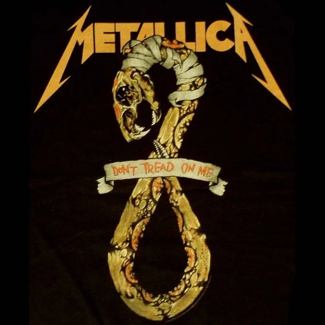 metallicica logo on black t - shirt with ribbon around the band's neck