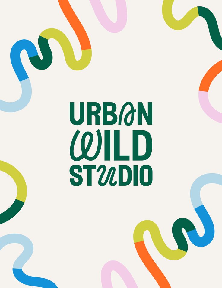 the words urban wild studio surrounded by colorful streamers in green, blue, yellow and orange