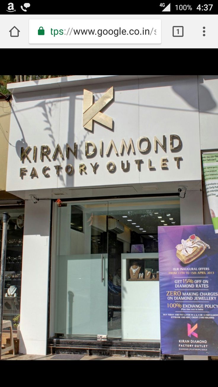 a store front with an advertisement on the side of it that says kranidiamond factory outlet