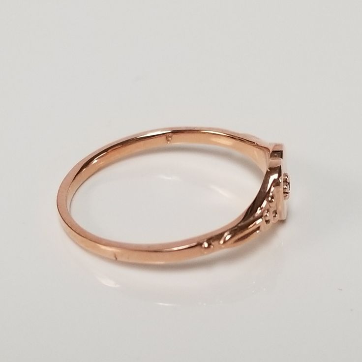 "Thanks for shopping our vintage estate store. We tend to sell well below wholesale and truly hope you enjoy all of our items. Many of the items are one of a kind, so please enjoy scrolling through the pictures and hopefully something will catch your eye. Black spots are from reflections. Estate 14k yellow or rose gold heart diamond ring. Beautiful ring, one that you will love. Color: Yellow or Rose Gold please select the color Ring size: 3 or 5 Setting: 6mm 1/4\" Band width: 1.2mm Weight: 1.25 Heirloom Rose Gold Stackable Rings Stamped 14k, Classic Heart Diamond Ring In Rose Gold, Classic Rose Gold Heart Diamond Ring, Rose Gold Promise Ring Stamped 14k, Elegant Pink Gold Heart Promise Ring, Valentine's Day 14k Gold Diamond Ring, Heirloom 14k Rose Gold Diamond Ring In Gold Color, Vintage 14k Rose Gold Diamond Ring, Elegant 14k Stamped Heart Ring For Anniversary