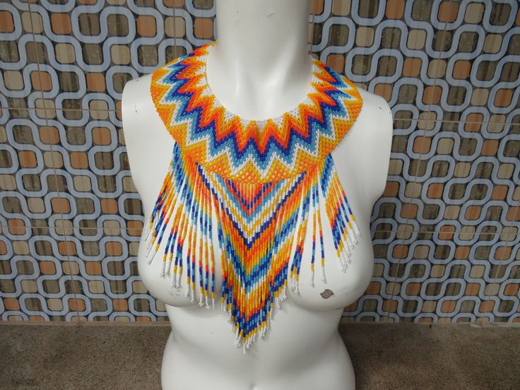 Handmade Huichol beaded collar statement bib necklace with dangle drop beads tribal boho hippie beach jewelry festival summer fun adjustable This beautiful collar bib necklace is adjustable at the back of the glass yellow beads Fun Funky Festival Adjustable Beaded Necklace With Large Beads For Festivals, Adjustable Large Beaded Necklace For Festivals, Summer Multicolor Beaded Necklaces, Handmade Dangle Beaded Necklaces For Beach, Handmade Bib Necklaces For The Beach, Unique Boho Beaded Necklaces For Festivals, Bohemian Dangle Beaded Necklaces For Beach, Unique Boho Beaded Necklace For Festivals, Unique Bib Necklaces With Large Beads For Festivals