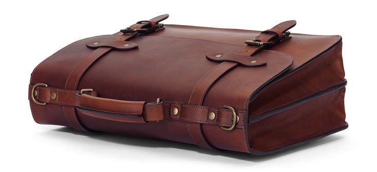 This handcrafted men's leather briefcase was inspired by vintage lawyer briefcases from decades ago. Made of full grain leather that's rich in character and solid antique brass hardware, this bag is built to last. Lawyer Briefcase, Men's Briefcase, School Look, Leather Briefcase Men, Antique Brass Hardware, Briefcase For Men, Mens Leather Bag, Leather Briefcase, Leather Wallet Mens