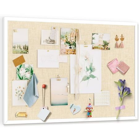 a bulletin board with pictures and magnets on it's side, including flowers