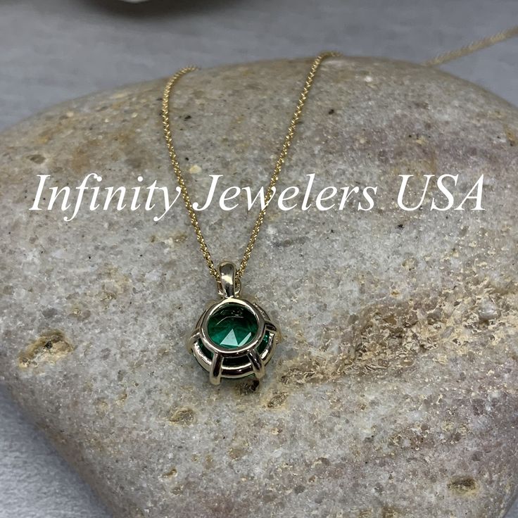 "The pendant pictured is a round lab created emerald and diamond #6885 -Approximate total carat weight: approx. 2.75ctw diamond equivalent -Center Stone Size: 9mm - approx. 2.70ct diamond equivalent -Center Stone Shape: round/rose cut -Gem Type: lab created emerald -Stone Clarity: VS2 -Stone Color: Rich Green -Moh's Scale: 8.5 hardness -Accent Stone Size: round approx. 0.04ct. diamond equivalent -Gem Type: genuine diamond -Stone Clarity: SI1 -Stone Color: G -Moh's Scale: 10 hardness -Metal Type Round 14k Gold Emerald Birthstone Necklace, Gold Emerald Necklace With Round Birthstone, Green 14k Gold Jewelry With Round Stone, Anniversary Birthstone Necklace With Prong Setting, Gift Round Emerald Cubic Zirconia Necklace, Round Cubic Zirconia Emerald Necklace Gift, 14k Gold Emerald Necklace With Round Pendant, 14k Gold Emerald Birthstone Necklace For Anniversary, Gold Emerald Pendant Necklace With Prong Setting