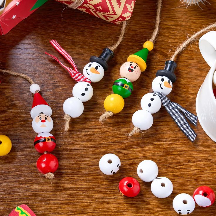 christmas ornaments and decorations on a wooden table