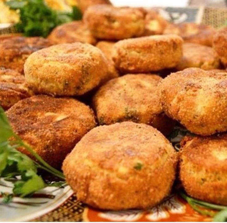 some fried food is on a plate and ready to be eaten