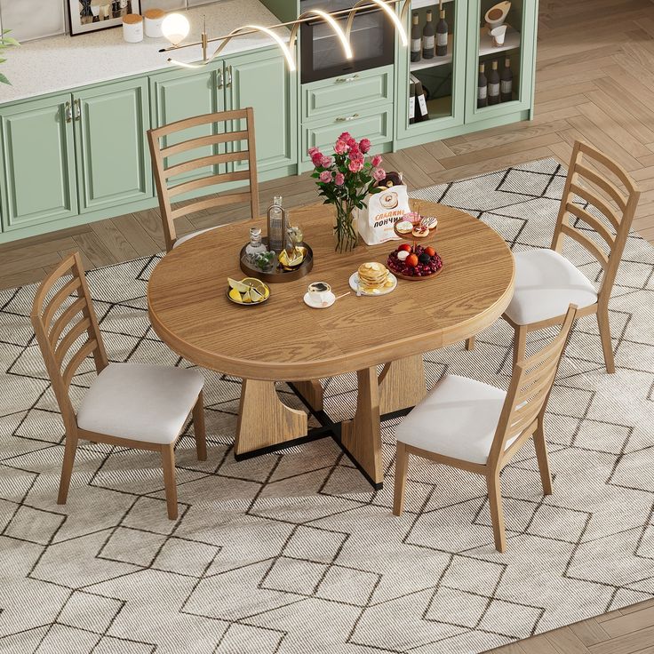 a kitchen table with chairs around it in the middle of a rug and cabinets behind it