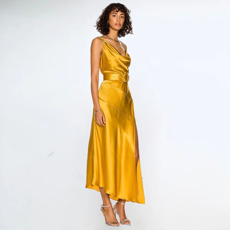 Gold Satin Midi Dress : Sleeve Style: Spaghetti Strap Fabric Type: POLYESTER Neckline: asymmetrical Dresses Length: Mid-Calf Closure Type: zipper Type: Camisole Material Composition: synthetic fiber Gender: WOMEN size: XS,S,M,L Hoco Dresses Gold, Gold Long Dress, Asymmetrical Dresses, Slim Fit Skirts, Birthday Dress Women, Wedding Guest Outfits, Elegant Gowns, Gold Evening Dresses, Dresses Luxury