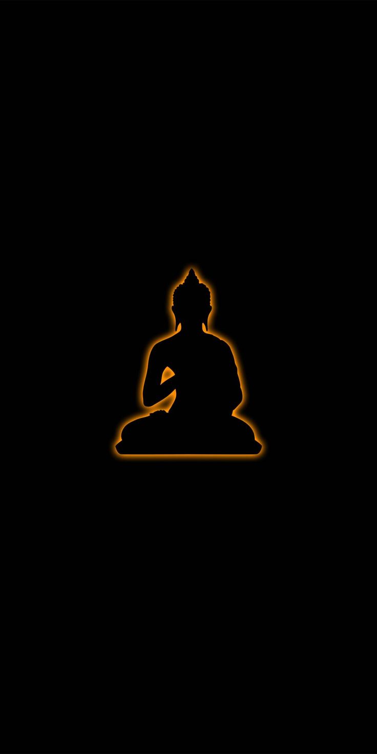 the silhouette of a person sitting in front of a black background with yellow light on it