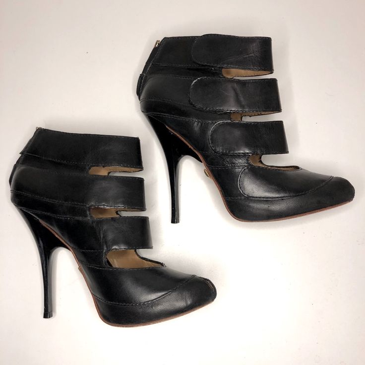 Sexy And Great For Night Out Or Bar Hopping! Color: Black Leather Zipper Closure In The Back Heels Height: 5” Stiletto Fits True To Size Pls See Picture Back Of The Left Heel Has Scratches/Scuff. Will Clean The Sole Before Shipping Modern Ankle Boot Heels For Night Out, Edgy Ankle-high Heels For Evening, Modern Ankle-high Heels For Night Out, Modern High Heels With Padded Ankle, Edgy Ankle Strap Heels Fitted, Ankle-high Heels With Padded Ankle For Night Out, Evening Ankle Boot Heels With Padded Ankle, Evening Heels With Padded Ankle Boot, Padded Ankle Heels For Evening