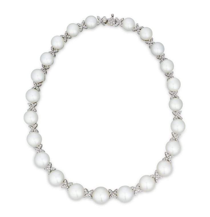 This classic necklace is the epitome of timeless elegance, with 23 exquisite South Sea pearls artfully interspersed with diamond-encrusted criss-cross motifs. South Sea pearls are among the largest and most coveted pearls in the world, and the examples in this exquisite strand necklace can be counted among the finest of their kind. The perfectly matched, graduated gems measure 10.5mm to 13.5mm, and each exhibits an exceptional luster. For added brilliance, 199 white brilliant cut diamonds, total Most Expensive Pearl, Pearl Oyster, Rare Pearls, Pearl And Diamond Necklace, Oyster Pearl, Diamond Choker, Classic Necklace, Sea Pearl, South Seas